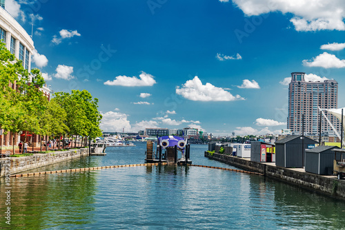 Floating Waste Collector on Waterfront. Green technology tackles pollution with renewable energy and smart design.