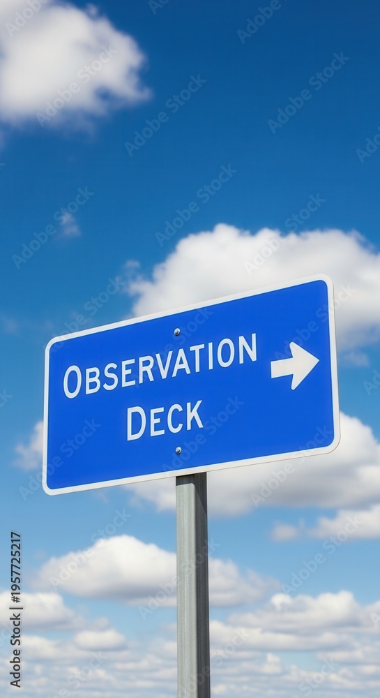 Fototapeta premium Directional Sign For Observation Deck Under A Blue Sky With Clouds