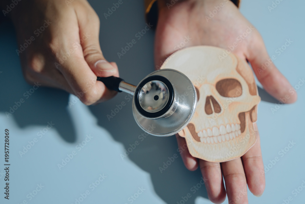 Fototapeta premium Stethoscope skull hand medical health anatomy doctor human examination healthcare close up person palm bone diagnostic instrument skeleton detail clinic professional care body medicine tool white