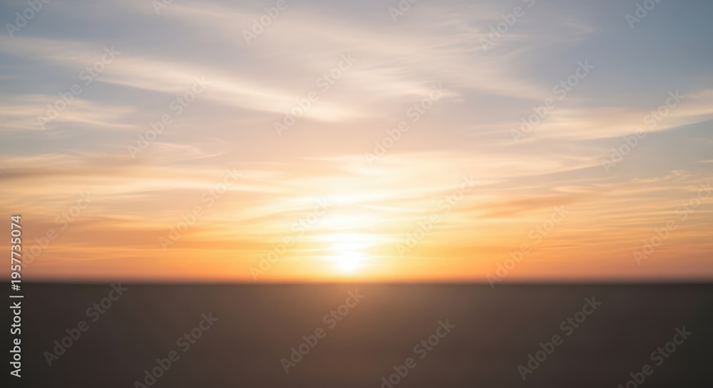 Obraz premium Golden Hour Sunset Over Serene Landscape with Vibrant Sky.