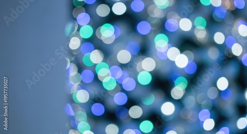 Abstract Bokeh Lights Background with Blue and Green Hues.