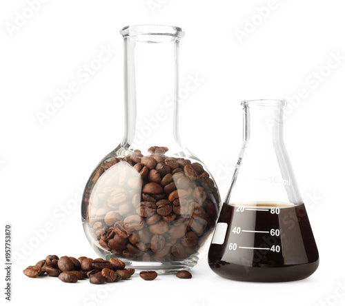 Foto Tasty coffee and beans in laboratory glassware isolated on white