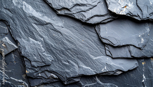 Dark slate blue rock texture with a rugged and natural stone grain