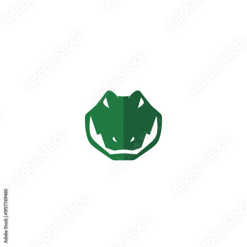 Striking minimalist green alligator head icon, a powerful and abstract reptile logo element capturing the essence of a formidable crocodile mascot graphic