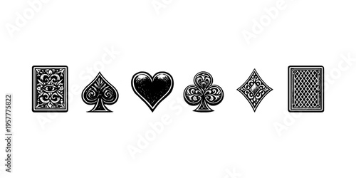 Collection of ornate playing card symbols and backs in a vintage style