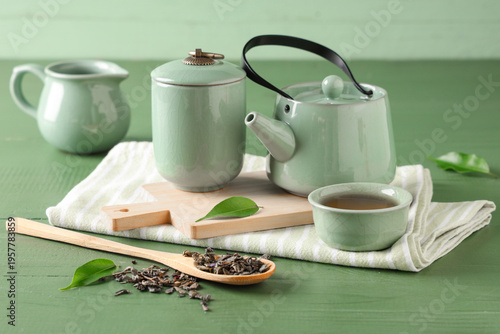 Cup of green tea, dry leave...
