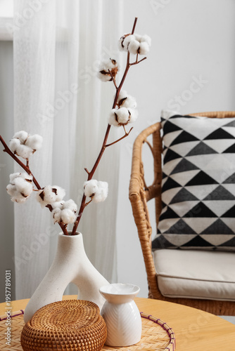 Vase with cotton flowers an...