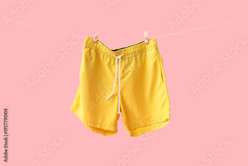 Swimming trunks hanging on ...