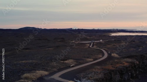 drone shot of a bridge between continents in Iceland black soil