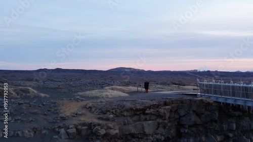 drone shot of a bridge between continents in Iceland black soil