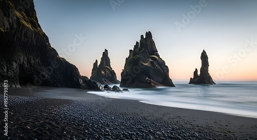 Dramatic rock formations on serene beach.
