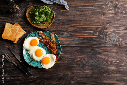 Plate with tasty fried eggs...