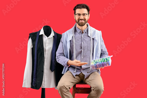 Male tailor with thread spo...