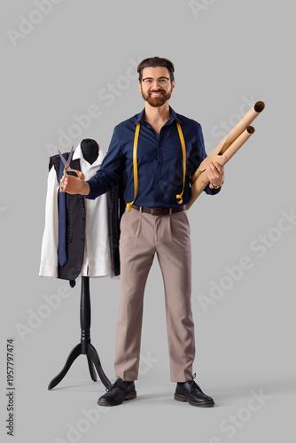 Male tailor with scissors a...
