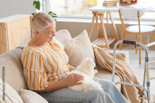 Mature woman with cute cat ...