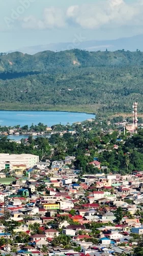Wallpaper Mural Coastal City residential area of Surigao, Philippines. Mindanao. Zoom view. Vertical, stories. Torontodigital.ca