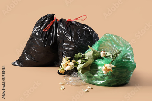 Open full garbage bags on b...