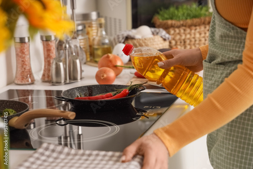 Woman with sunflower oil fr...