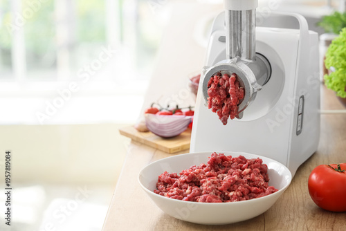 Modern meat grinder with mi...