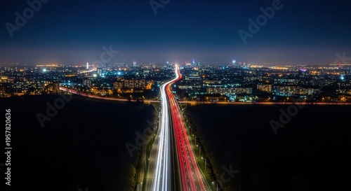Illuminated Cityscape With Streaking Light Trails On Highway At Night