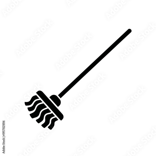 Broom with long wooden handle.