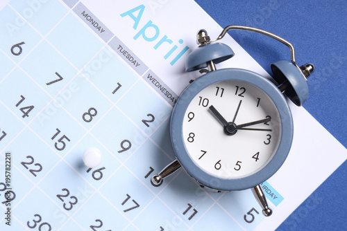 Calendar with alarm clock a...