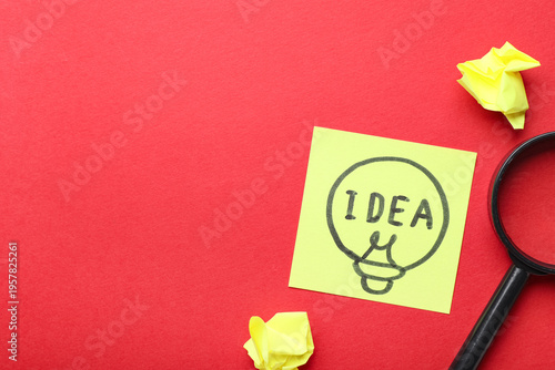 Sticky note with drawn ligh...