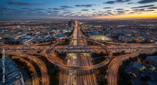 Illuminated Urban Freeway Interchange During Twilight Hour