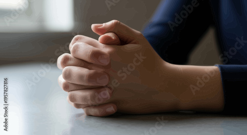 Close up of clasped hands representing thought and support