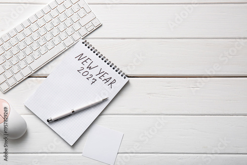 Notebook with text NEW YEAR...