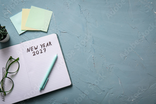 Notebook with text NEW YEAR...
