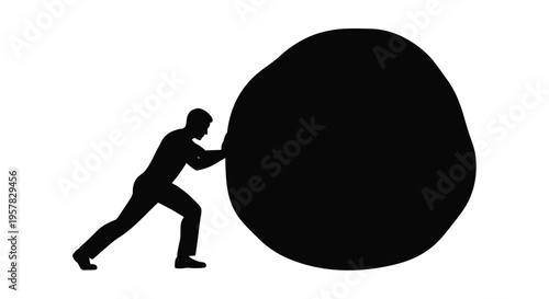 Man struggling to push a large boulder uphill a powerful silhouette