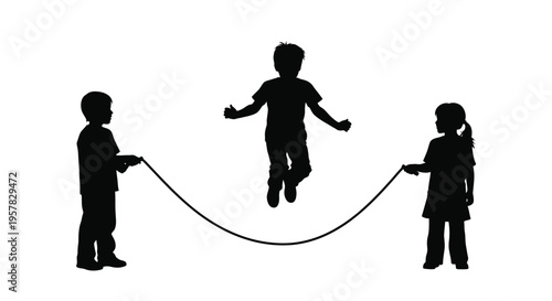 Children joyfully playing jump rope outdoors a striking silhouette