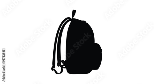 A black backpack is shown in a striking dark silhouette