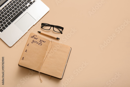 Notebook with text NEW YEAR...