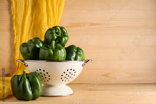 Colander with green bell pe...