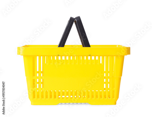 Yellow shopping basket on w...