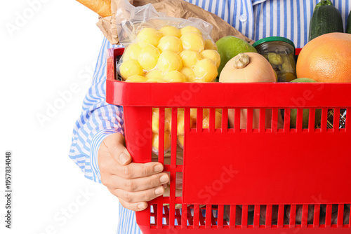 Woman holding red shopping ...