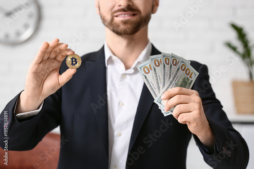 Businessman with bitcoin an...