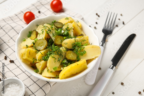 Bowl of tasty potato salad ...