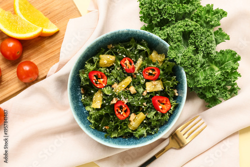 Bowl of tasty kale salad wi...