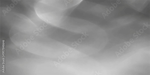 An abstract smoke background features smooth blue and gray mist patterns flowing through a dark sky with soft light and clouds for a slow motion design wallpaper