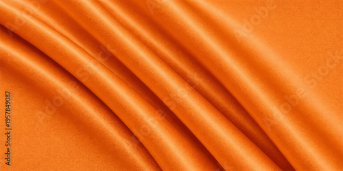 A smooth orange silk fabric background features soft wavy curves and a shiny gold satin texture creating a decorative drapery backdrop with elegant light patterns