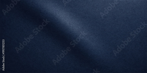 Dark blue fabric texture with a rough denim material surface and a grunge textile pattern on a dark cotton cloth backdrop for a textured fashion wallpaper