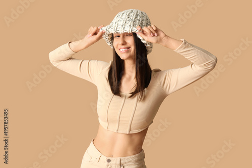 Beautiful young woman in st...
