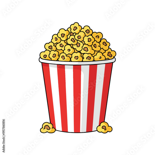 A red and white striped bucket overflows with golden popcorn, with kernels scattered