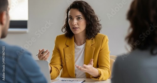 Woman speaks during meeting