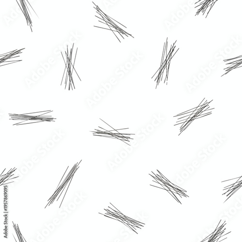 Scatter of thin, dark gray, intersecting lines on a white background, creating a randomized pattern