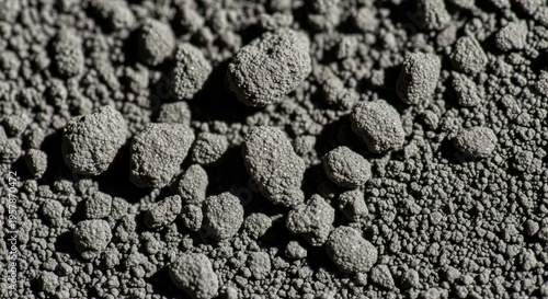 Close-up view of fine powdery lunar regolith dust covering the moon's surface.
