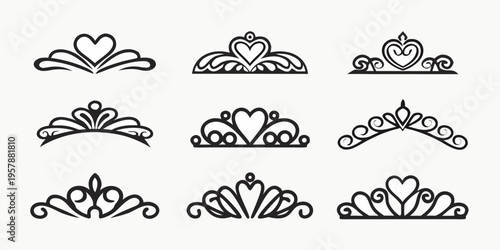 Collection of ornate black filigree swirls and decorative crown like designs